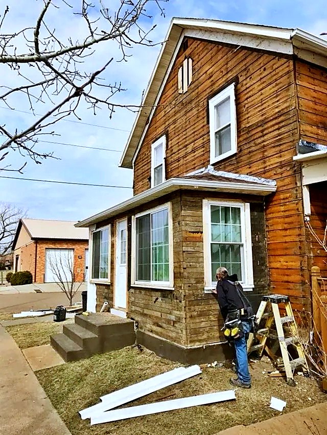 Zulauf crew installing siding