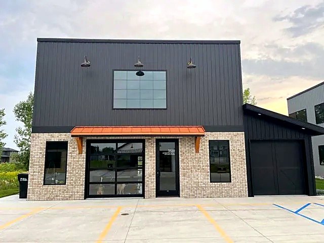 Charcoal metal and brick storefront